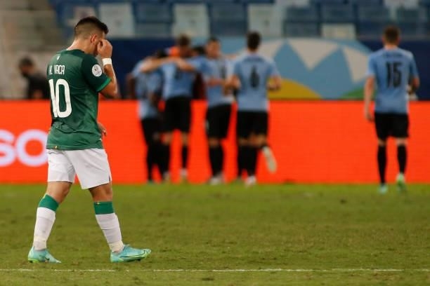 Henry Vaca of Bolivia looks dejected after Uruguay's second goal scored by Edinson Cavani of Uruguay during a Group A match between Bolivia and...
