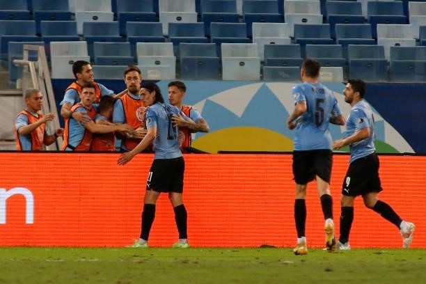 Edinson Cavani of Uruguay celebrates with teammates after scoring the second goal of his team during a Group A match between Bolivia and Uruguay as...