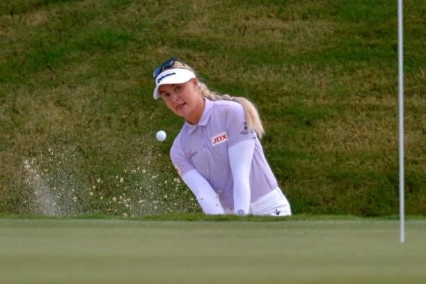 Charley Hull of England plays her shot out of the bunker during the first round of the KPMG Women's PGA Championship at Atlanta Athletic Club on June...