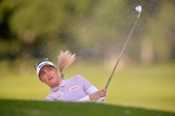 Charley Hull of England plays her shot out of the bunker during the first round of the KPMG Women's PGA Championship at Atlanta Athletic Club on June...