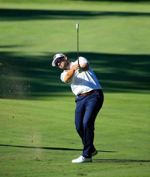 Paul Barjon of New Caledonia hits his second shot on the eighth hole during the first round of the Live And Work In Maine Open held at Falmouth...
