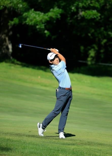 Dylan Wu hits his second shot on the eighth hole during the first round of the Live And Work In Maine Open held at Falmouth Country Club on June 24,...