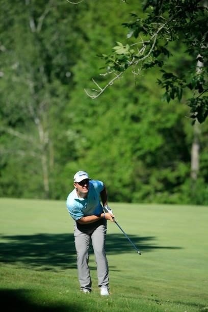 Justin Lower reacts to his second shot on the eighth hole during the first round of the Live And Work In Maine Open held at Falmouth Country Club on...