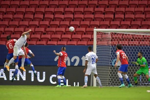 Braian Samudio of Paraguay heads the ball to score the the first goal of his team during a Group A match between Chile and Paraguay as part of Copa...