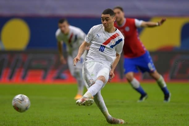 Miguel Almiron of Paraguay takes a penalty kick to score the second goal of his team during a Group A match between Chile and Paraguay as part of...
