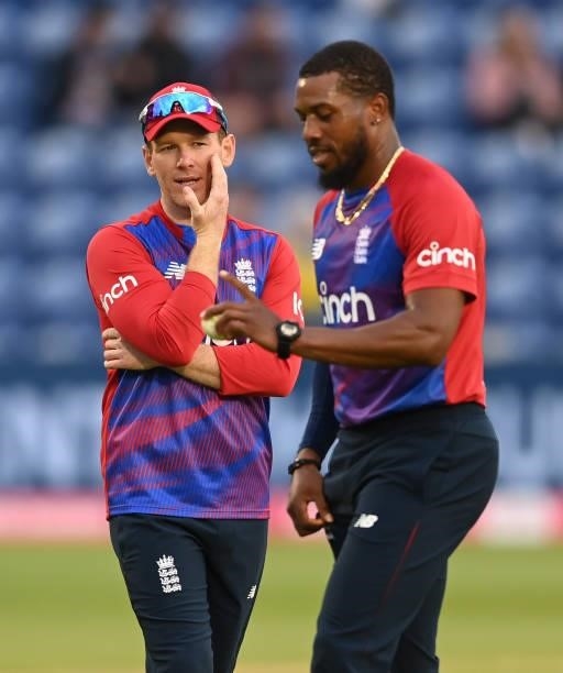 Eoin Morgan talks to Chris Jordan of England during the second T20 International between England and Sri Lanka at Sophia Gardens on June 24, 2021 in...
