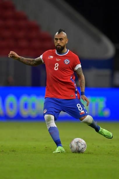 Arturo Vidal of Chile kicks the ball during a Group A match between Chile and Paraguay as part of Copa America Brazil 2021 at Mane Garrincha Stadium...