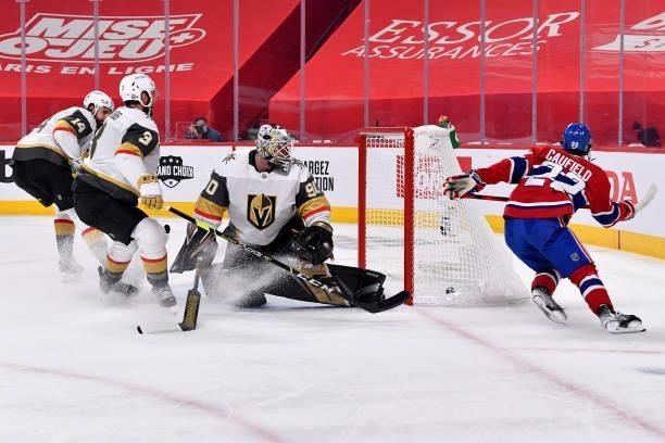 Cole Caufield of the Montreal Canadiens scores a goal against Robin Lehner of the Vegas Golden Knights during the second period in Game Six of the...