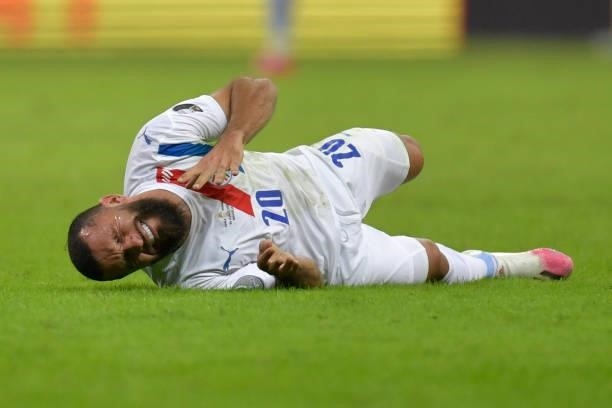Antonio Bareiro of Paraguay reacts after suffering an injury during a Group A match between Chile and Paraguay as part of Copa America Brazil 2021 at...