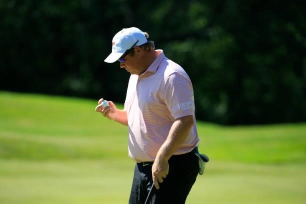 Conrad Schindler reacts to a missed birdie putt on the 15th green during the first round of the Live And Work In Maine Open held at Falmouth Country...