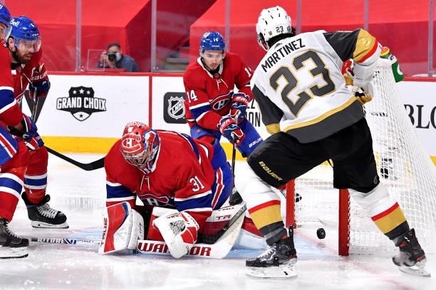 Alec Martinez of the Vegas Golden Knights scores a goal past Carey Price of the Montreal Canadiens during the third period in Game Six of the Stanley...