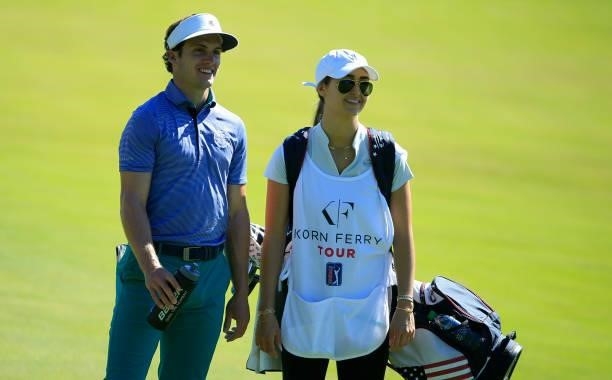 James Nicholas looks on with his caddie during the first round of the Live And Work In Maine Open held at Falmouth Country Club on June 24, 2021 in...