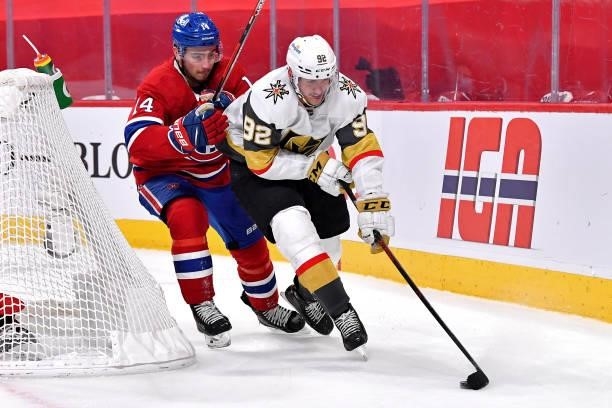 Tomas Nosek of the Vegas Golden Knights is defended by Nick Suzuki of the Montreal Canadiens during the third period in Game Six of the Stanley Cup...