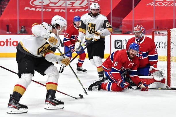 Shea Weber of the Montreal Canadiens attempts to block a shot against Mattias Janmark of the Vegas Golden Knights as Carey Price tends net during the...
