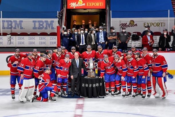 The Montreal Canadiens pose with the Clarence S. Campbell Bowl after defeating the Vegas Golden Knights 3-2 during the first overtime period in Game...