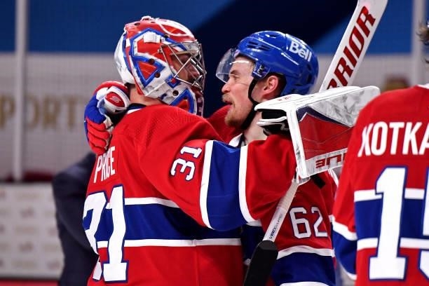 Carey Price and Artturi Lehkonen of the Montreal Canadiens congratulate each other on the team's 3-2 overtime win against the Vegas Golden Knights in...