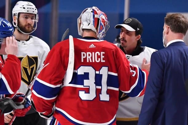 Carey Price of the Montreal Canadiens and Marc-Andre Fleury of the Vegas Golden Knights shake hands following the Canadians 3-2 overtime win in Game...