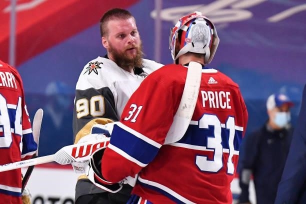 Carey Price of the Montreal Canadiens and Robin Lehner of the Vegas Golden Knights shake hands following the Canadians 3-2 overtime win in Game Six...