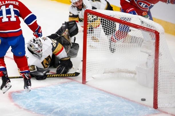 Robin Lehner of the Vegas Golden Knights allows the game-winning goal by Artturi Lehkonen of the Montreal Canadiens past during the first overtime...