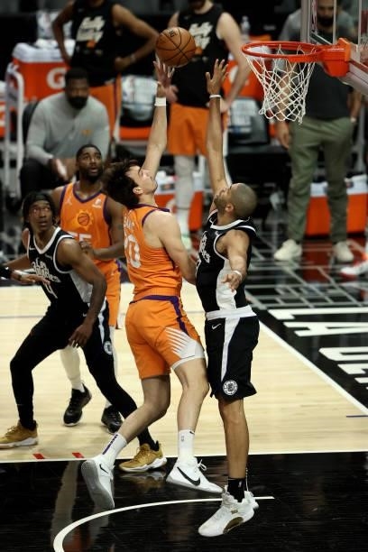 Dario Saric of the Phoenix Suns goes up for a shot against Nicolas Batum of the LA Clippers during the second half of game three of the Western...