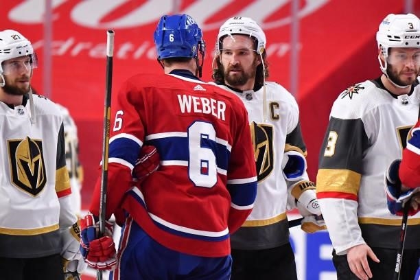 Shea Weber of the Montreal Canadiens and Jonathan Marchessault of the Vegas Golden Knights shake hands following the Canadiens 3-2 overtime win in...