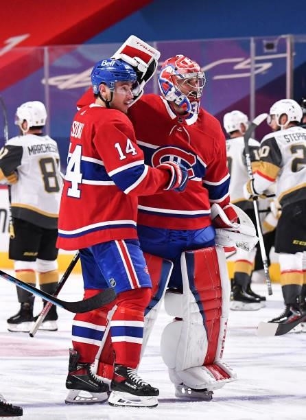 Nick Suzuki and Carey Price of the Montreal Canadiens celebrate the game-winning overtime goal scored by Artturi Lehkonen against the Vegas Golden...