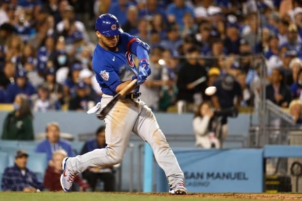 Willson Contreras of the Chicago Cubs hits a two run home run against the Los Angeles Dodgers during the sixth inning at Dodger Stadium on June 24,...
