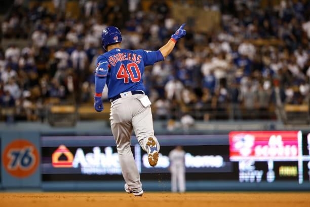 Willson Contreras of the Chicago Cubs gestures after hitting a two run home run against the Los Angeles Dodgers during the sixth inning at Dodger...