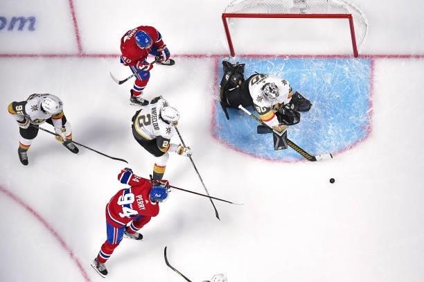 Robin Lehner of the Vegas Golden Knights makes the save against against Corey Perry of the Montreal Canadiens during the third period in Game Six of...
