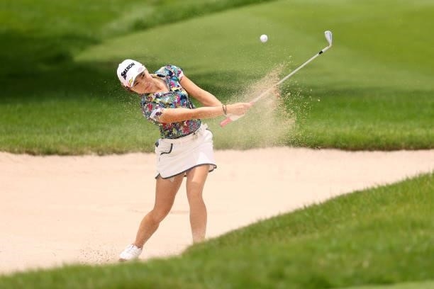 Risa Murata of Japan hits out from a bunker on the 13th hole during the second round of the Earth Mondamin Cup at Camellia Hills Country Club on June...