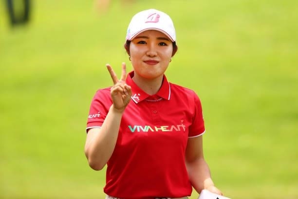 Ayaka Furue of Japan poses after the birdie on the 13th green during the second round of the Earth Mondamin Cup at Camellia Hills Country Club on...