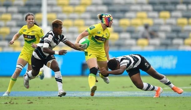 Sharni Williams is tackled during the Oceania Sevens Challenge match between Fiji and Australia at Queensland Country Bank Stadium on June 25, 2021...