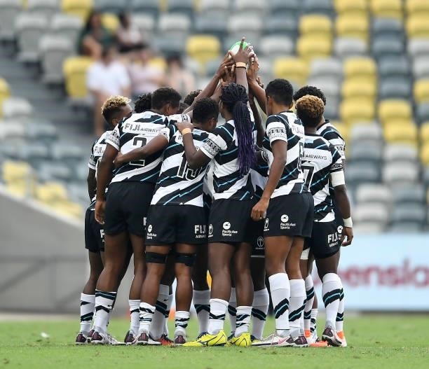 Fiji gather in a huddle before the start of the Oceania Sevens Challenge match between Fiji and Australia at Queensland Country Bank Stadium on June...