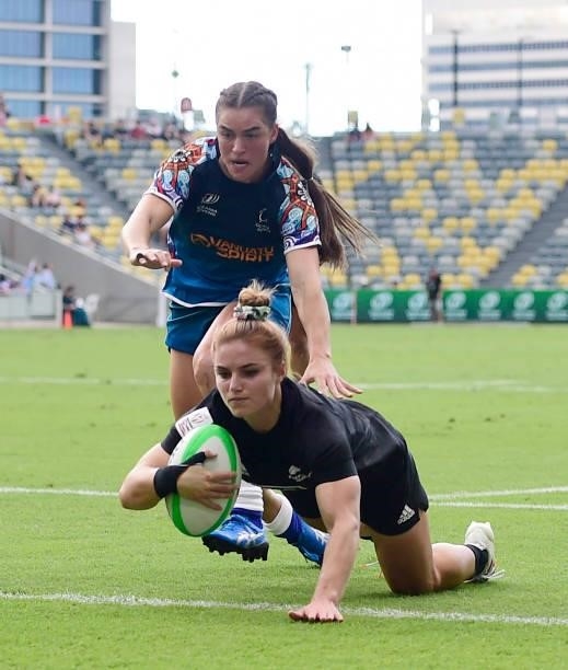 Michaela Blyde of New Zealand scores a try during the Oceania Sevens Challenge match between New Zealand and Oceania at Queensland Country Bank...