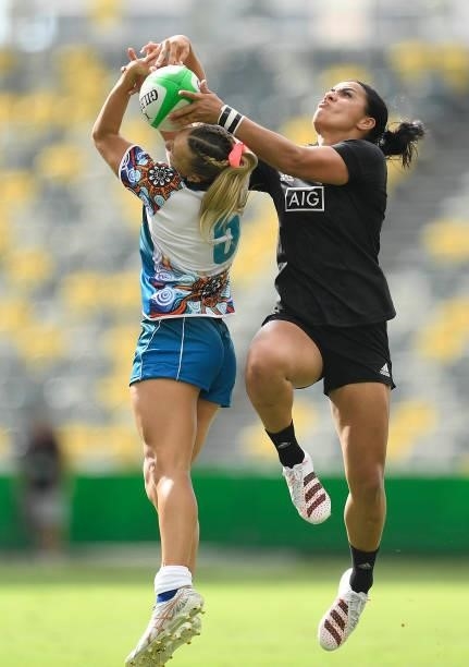 Stacey Waaka of New Zealand contest a high ball with Teahan Levi of Oceania during the Oceania Sevens Challenge match between New Zealand and Oceania...