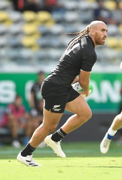 Joe Webber of New Zealand looks to pass the ball during the Oceania Sevens Challenge match between New Zealand and Oceania at Queensland Country Bank...