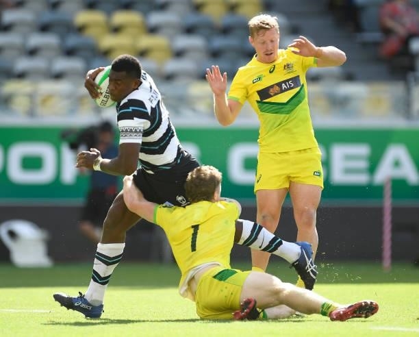 Kalioni Nasoko of Fiji is tackled during the Oceania Sevens Challenge match between Fiji and Australia at Queensland Country Bank Stadium on June 25,...