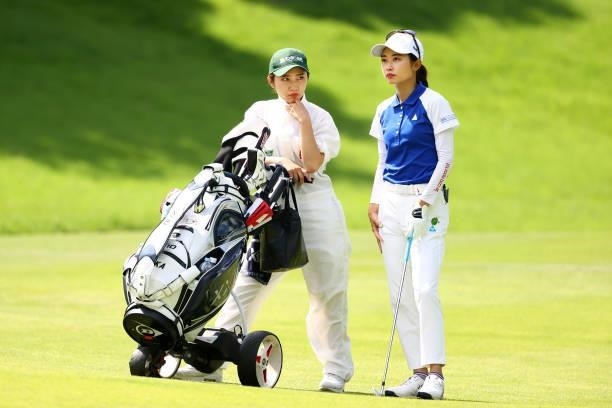 Yuka Yasuda of Japan and her sister and caddie Miyu are seen on the 16th hole during the second round of the Earth Mondamin Cup at Camellia Hills...