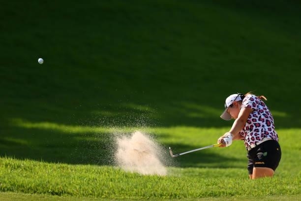Anna Kono of Japan hits out her second shot from a bunker on the 16th hole during the second round of the Earth Mondamin Cup at Camellia Hills...