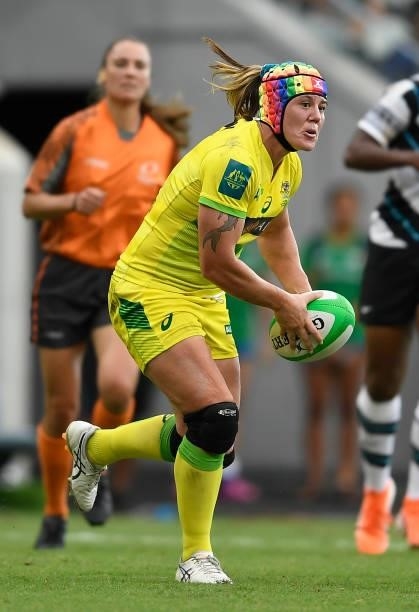 Sharni Williams of Australia runs the ball during the Oceania Sevens Challenge match between Fiji and Australia at Queensland Country Bank Stadium on...