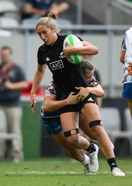 Sarah Hirini of New Zealand is tackled during the Oceania Sevens Challenge match between New Zealand and Oceania at Queensland Country Bank Stadium...