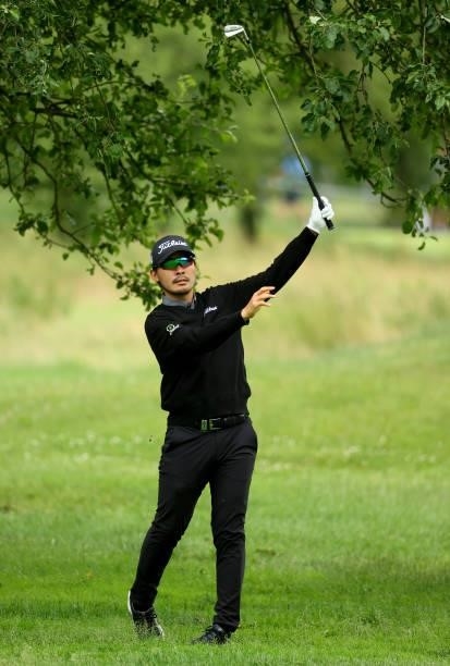 Masahiro Kawamura of Japan plays his second shot the 9th hole during the second round of The BMW International Open at Golfclub Munchen Eichenried on...