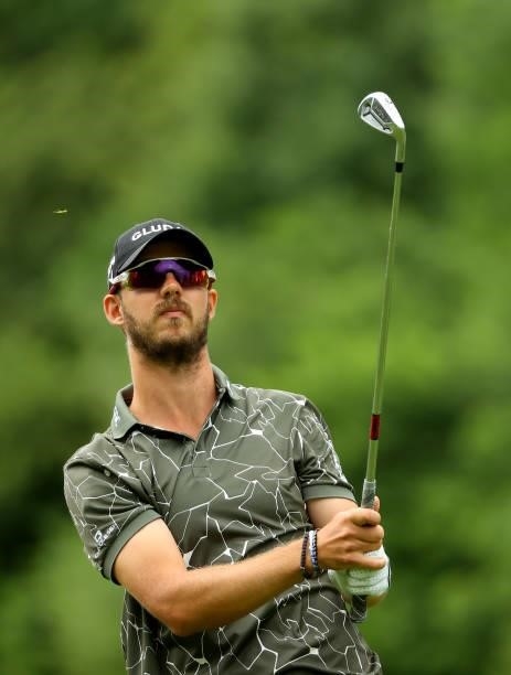 Benjamin Poke of Poland plays his second shot on the 9th hole during the second round of The BMW International Open at Golfclub Munchen Eichenried on...