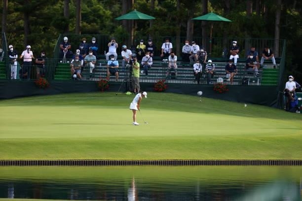 Bo-mee Lee of South Korea holes the birdie putt on the 9th green during the second round of the Earth Mondamin Cup at Camellia Hills Country Club on...