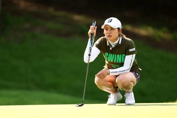 Momoko Osato of Japan lines up a putt on the 16th green during the second round of the Earth Mondamin Cup at Camellia Hills Country Club on June 25,...