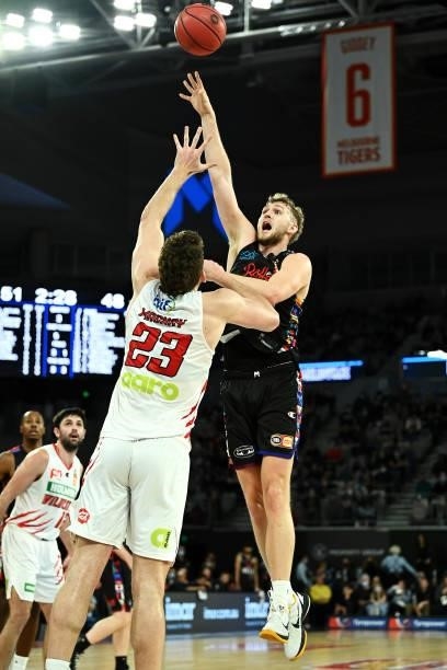 Jock Landale of Melbourne United shoots over Will Magnay of the Wildcats during game three of the NBL Grand Final Series between Melbourne United and...