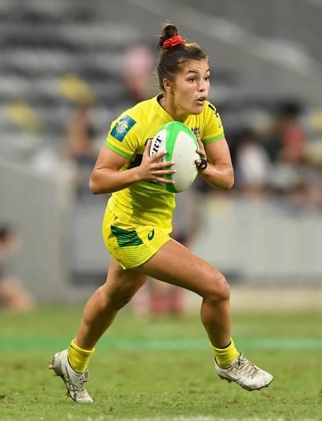 Madison Higgins-Ashby of Australia runs the ball during the Oceania Sevens Challenge match between Australia and Oceania at Queensland Country Bank...