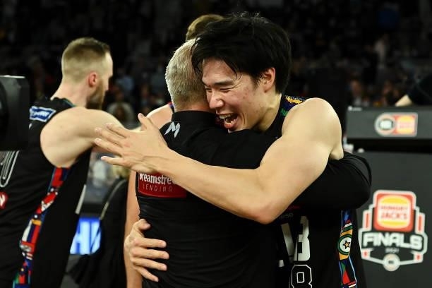 United coach Dean Vickerman and Yudai Baba of Melbourne United celebrate victory game three of the NBL Grand Final Series between Melbourne United...
