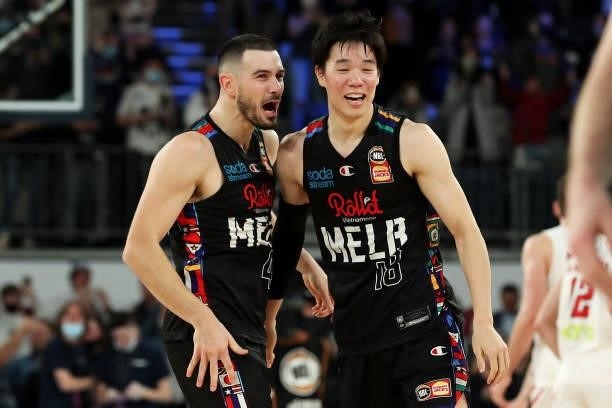Chris Goulding and Yudai Baba of Melbourne United celebrate victory game three of the NBL Grand Final Series between Melbourne United and the Perth...