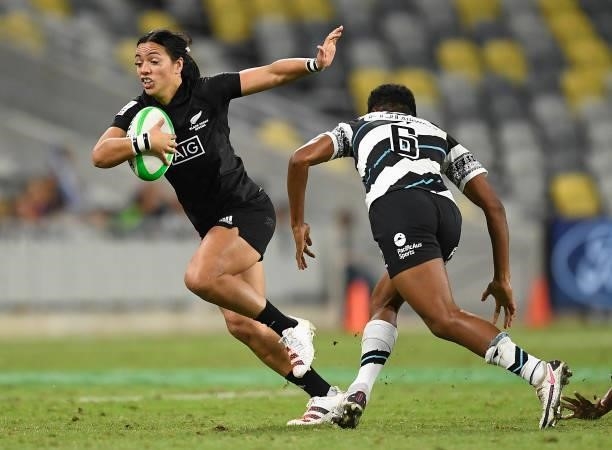 Stacey Waaka of New Zealand attempts to get past Sesenieli Donu of Fiji during the Oceania Sevens Challenge match between New Zealand and Fiji at...